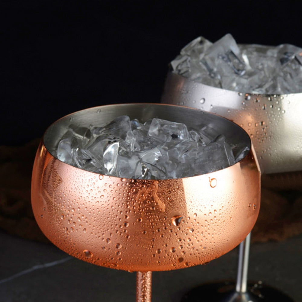 Close-up of Stainless Steel Cocktail Coupes with ice (Rose Gold & Silver) - The Stainless Sipper